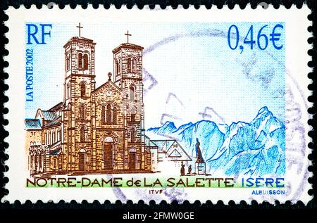 FRANCIA - CIRCA 2002: Un francobollo stampato in Francia mostra Notre Dame de la Salette circa 2002 Foto Stock