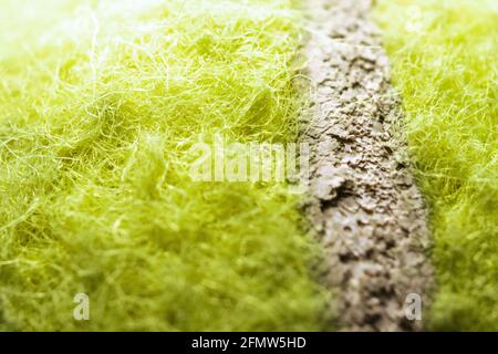 Extreme Closeup di materiale da palla da tennis Foto Stock