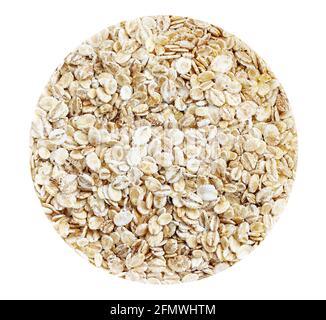 Fiocchi di orzo organici isolati su sfondo bianco circolare. Foto Stock