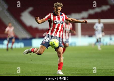 Madrid, Spagna. 12 maggio 2021. Marco Llorente dell'Atletico scatta durante la partita di calcio spagnola la Liga tra l'Atletico Madrid e il Real Sociedad a Madrid, in Spagna, il 12 maggio 2021. Credit: Edward F. Peters/Xinhua/Alamy Live News Foto Stock