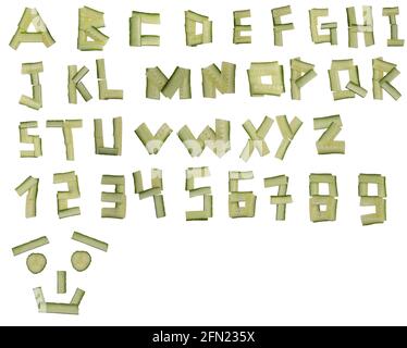 Lettere in bastoni di verdure di cetriolo, disposte in alfabeto e numeri Foto Stock