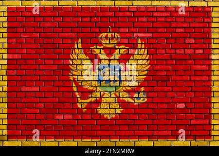 Bandiera del Montenegro dipinta su muro di mattoni Foto Stock