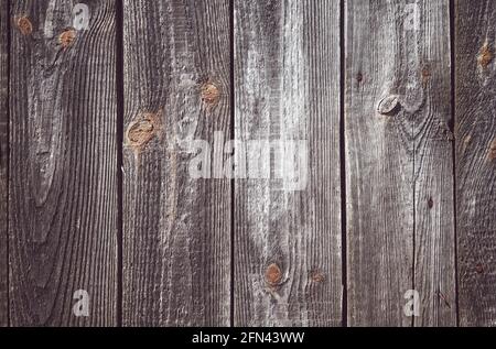 Immagine di un vecchio muro di legno grezzo. Foto Stock