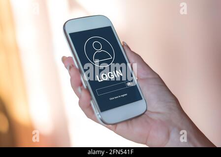 Lo schermo dello smartphone visualizza un concetto di accesso Foto Stock
