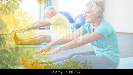 Composizione di uomo anziano e donna che si esercitano in palestra con sovrapposizione struttura Foto Stock