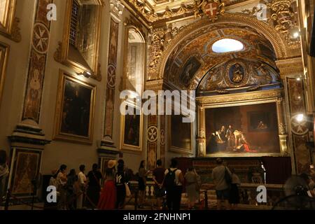 Valletta. Malta. Co-Cattedrale di San Giovanni. Il Caravaggio dipinge la decapitazione di San Giovanni Battista nell'Oratorio. Foto Stock