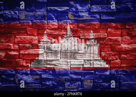 Bandiera nazionale della Cambogia su muro di pietra background.The concetto di orgoglio nazionale e simbolo del paese. Bandiera banner su fondo texture pietra Foto Stock