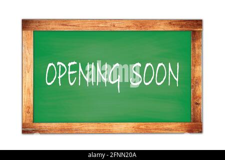 PRESTO IL testo DI APERTURA scritto su lavagna verde della scuola della cornice di legno. Foto Stock