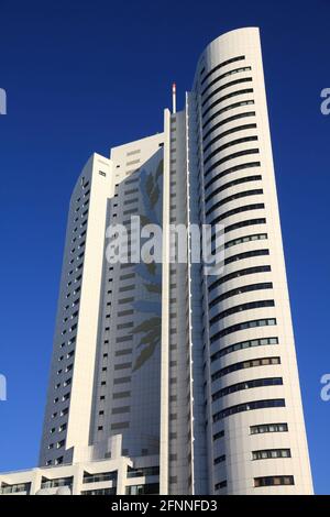 VIENNA, AUSTRIA - 6 SETTEMBRE 2011: Edificio Hochhaus Neue Donau a Vienna. L'edificio residenziale progettato da Harry Seidler fu finito nel 2002, Foto Stock