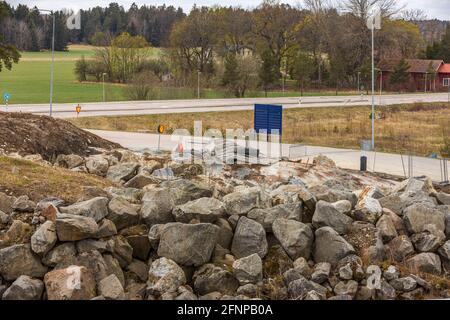 Vista ravvicinata dei lavori di costruzione su terreni rocciosi. Svezia. Foto Stock