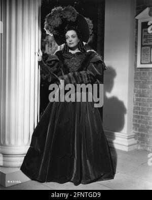 JOAN CRAWFORD Ritratto a lunghezza intera in abito di Glibert ADRIAN Per LA SPLENDIDA HUSSY 1936 regista CLARENCE MARRONE dal Prenota a cura di Samuel Hopkins Adams Metro Goldwyn Mayer Foto Stock
