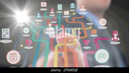Composizione di touchscreen uomo d'affari con icone colorate digitali Foto Stock
