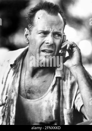 Bruce Willis, Ritratto di testa e spalle sul set del film, 'Die Hard with a Vengeance', 20th Century-Fox, 1995 Foto Stock