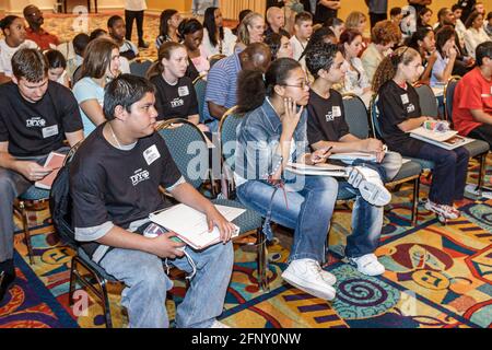 Miami Florida,Drug Free Youth in Town DFYIT Leadership Conference,teenage teenagers students ispanic frequent seminario sitting listing,boys g Foto Stock