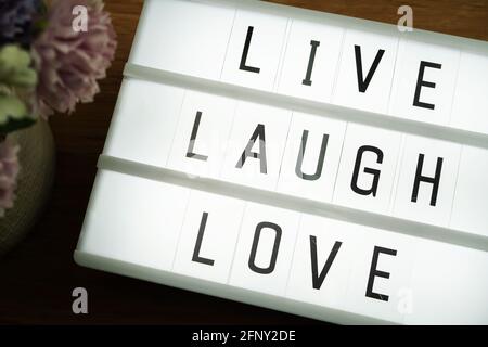 Live Laugh Love Word in light box Foto Stock