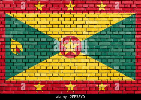 Bandiera di Grenada dipinta su un muro di mattoni Foto Stock