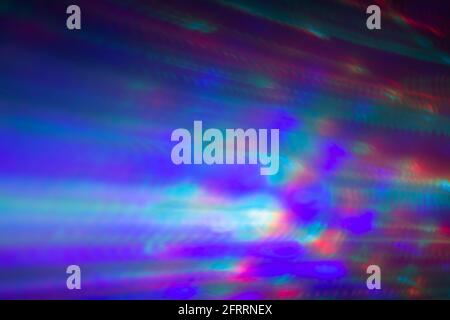 Abstract photo of motion and colorful lights at dark. Abstract high resolution background. Copy space. Foto Stock