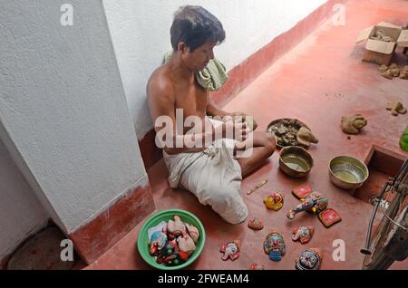 Raghurajpur in Odisha è conosciuto alla gente del mondo come villaggio dell'artista. La maggior parte delle famiglie del villaggio sono associate con scultura d'arte. Foto Stock