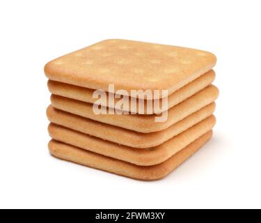 Pila di diversi biscotti con sale isolato su bianco. Foto Stock