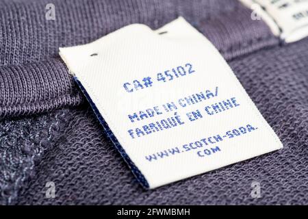 Etichetta Made in China su abiti Scotch e Soda Foto Stock
