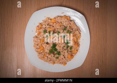 Risotto di zucca con coriandolo Foto Stock