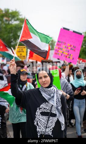 Free Palestine Rally in Queens alla luce del continuo Escalation di eventi e cessate il fuoco a Gaza tra palestinesi E israeliani Foto Stock