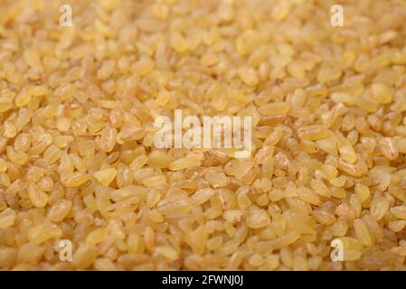 Primo piano di grano di bulgaro non cotti di fondo Foto Stock