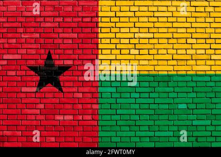 Bandiera di Guinea-Bissau dipinto su muro di mattoni Foto Stock