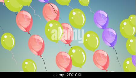 Composizione di palloncini rosa, verde e viola su sfondo blu Foto Stock