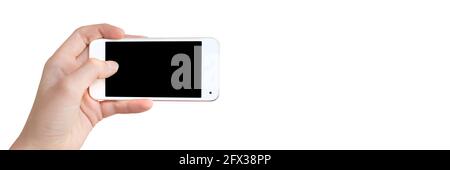 Mano che tiene un telefono, schermo vuoto, isolato su sfondo bianco panoramico Foto Stock