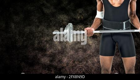 Composizione di sezione bassa di uomo forte afroamericano che solleva campanello con spazio per la copia Foto Stock