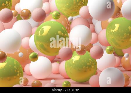 Rappresentazione tridimensionale di varie sfere galleggianti su sfondo rosa Foto Stock