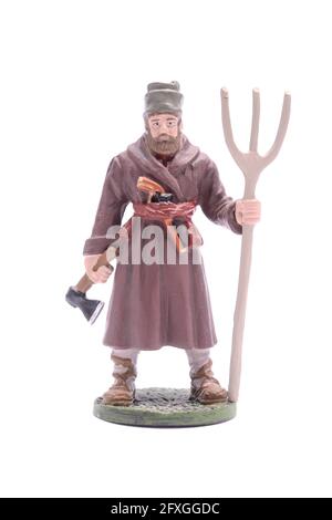 Un soldato in stagno con una forchetta isolata su bianco Foto Stock