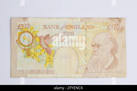 Nota bancaria British Pound del 20 vecchia e danneggiata Foto Stock