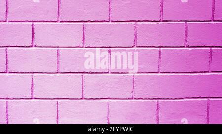 Sfondo parete rosa decorativa, parete in mattoni. Texture parete di blocco. Spazio di copia. Foto Stock