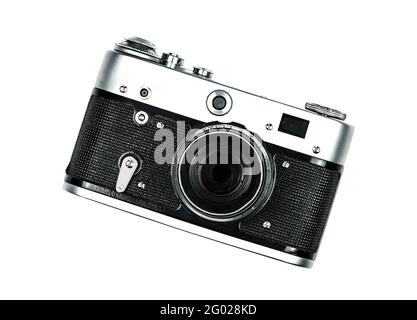 Telecamera isolata. Una vecchia fotocamera vintage isolata su sfondo bianco. Vista dall'alto. Foto Stock