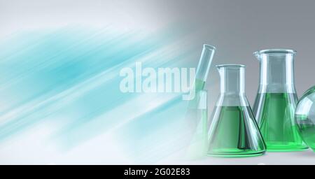 Composizione di matracci conici di liquido verde e agitatore, con spazio di copia blu sfocato Foto Stock