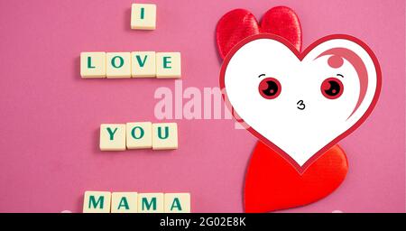 Composizione dei cuori e ti amo mama testo su cubi Foto Stock