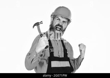 Lavoro tecnico. Impulso per i cambiamenti. Uomo maturo bearded in uniforme. Ragazzo con martello. Buon martello. Suggerimenti essenziali per un corretto utilizzo del martello Foto Stock