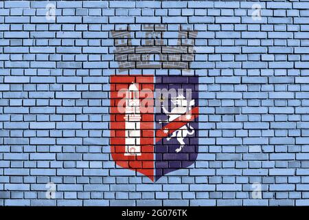 Bandiera di Tirana, Albania dipinto su muro di mattoni Foto Stock