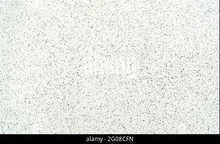 Motivo bianco e nero di fondo texture pavimento terrazzo. Pavimento terrazzo. Pavimento a terrazzo con motivo senza cuciture. La parete è costituita da trucioli di marmo. Foto Stock