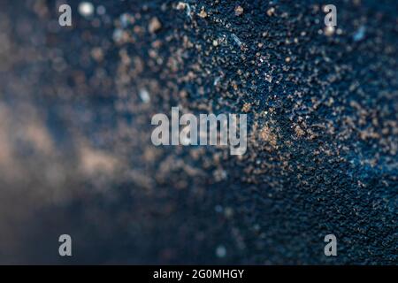 Texture astratta e grintosa con tonalità blu e oro. Spazio negativo per la copia Foto Stock
