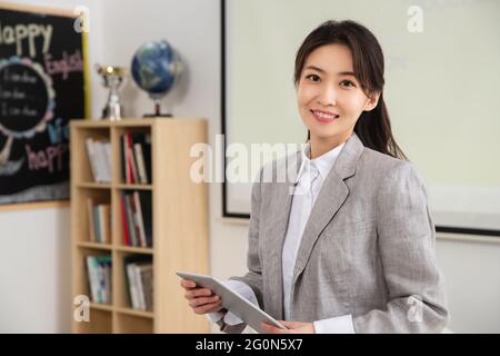 Giovani insegnanti della classe Foto Stock