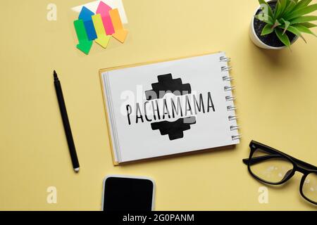 Vacanza pachamama mano disegnata su un notebook. Foto Stock