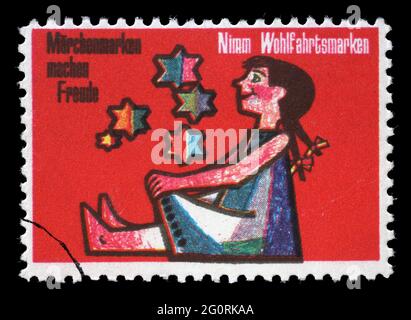 Un francobollo stampato in Germania, 'Take Welfare Stamp', circa 1961 Foto Stock