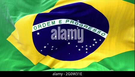 Primo piano vista della bandiera del Brasile che oscilla nel vento. Messa a fuoco selettiva. Foto Stock