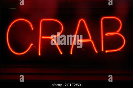 Fotografia composito Neon Seafood Restaurant segno Foto Stock