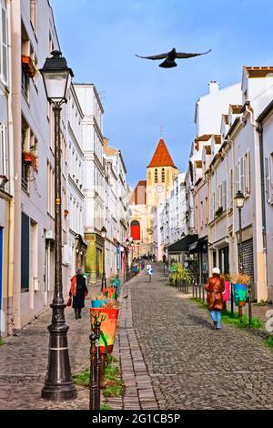 STRADA ACCIOTTOLATA SAINT-BLAISE E CHIESA DI SAINT-GERMAIN DE CHARONNE A PARIGI, FRANCIA Foto Stock