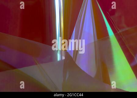 Sfondo olografico astratto multicolore. Colori rosso e verde, stile retrò futuristico. Foto Stock