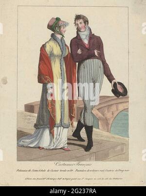 Costumi Français, 1799: Polonaise de Satin (...). Donna in un 'polonaise' di satin. Sciarpa di Casimir con ricamo in oro. Altri accessori: cappello, scarpe piatte con punte a punta. Uomo vestito con un fitto, gilet e pantaloni lunghi a righe di velluto. Fazzoletto. Calze di pizzo di foglio nero. I capelli sono tagliati brevemente ('à la brutus'). Cappello in mano. Foto Stock